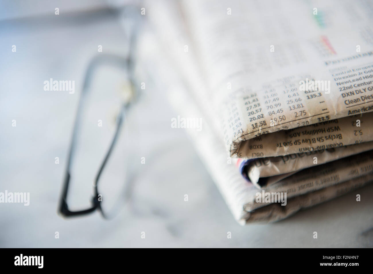 Close up of business newspaper with stocks Stock Photo