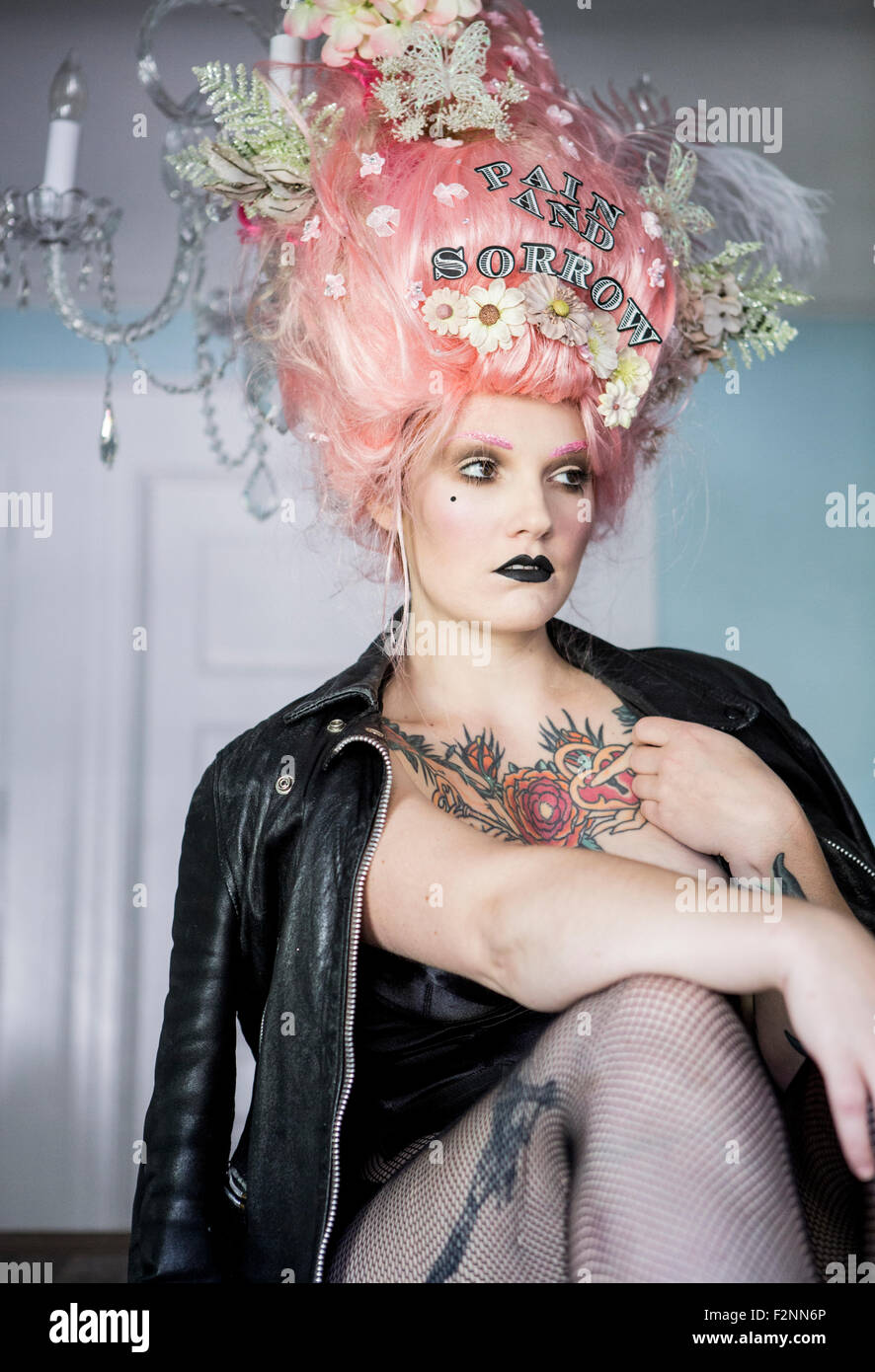 Glamorous woman with flowers in hair Stock Photo