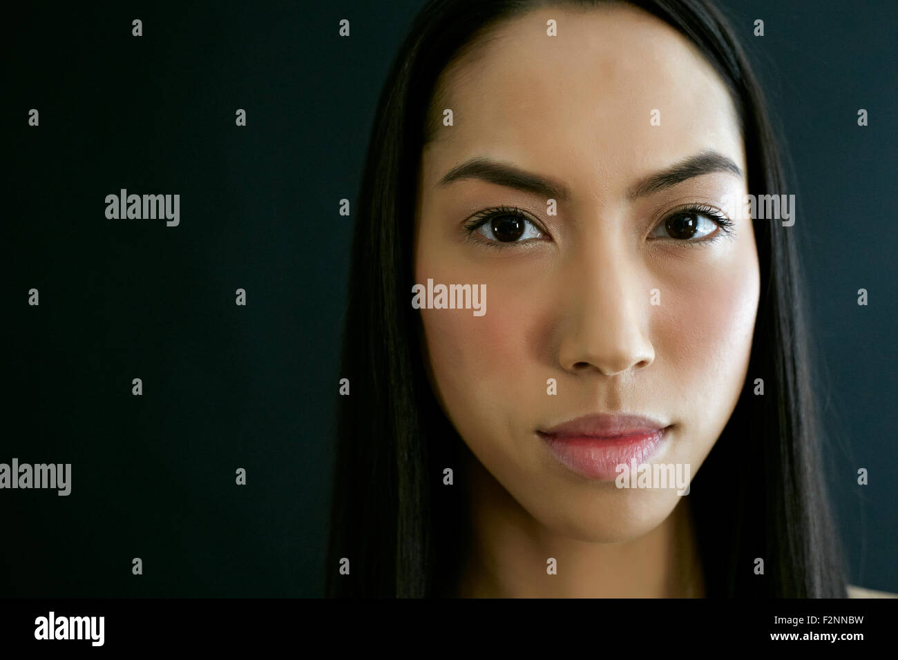 Close up of serious mixed race woman Stock Photo Alamy