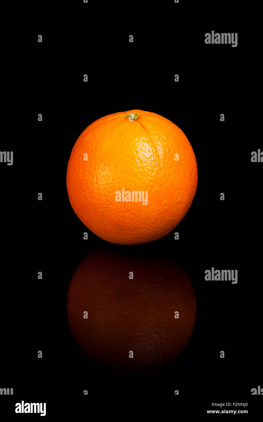 Reflection Orange Background An orange on a black reflective background Stock Photo - Alamy
