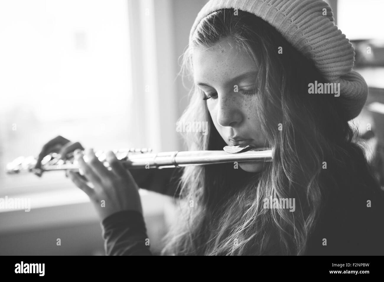 Girl playing flute hires stock photography and images Alamy