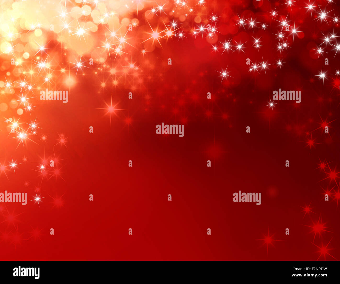 Shiny red background with starlight raining down Stock Photo