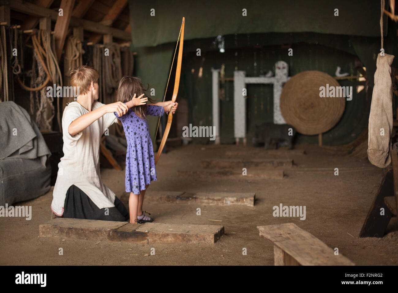 Children practicing archery with target Stock Photo Alamy