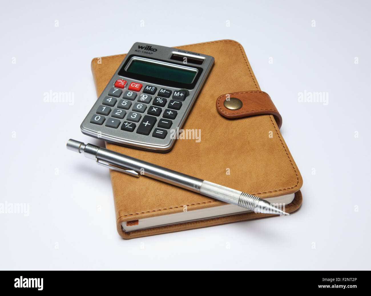 Notebook pen calculator Stock Photo Alamy