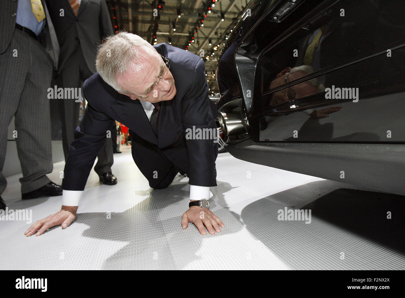 Geneva, Switzerland. 04th Mar, 2008. FILE - A file picture made available on 22 September 2015 shows Volkswagen AG CEO Martin Winterkorn as he checks the bottom side of a Porsche GT2 during a tour on the first media day of the 78th Geneva International Motor Show in Geneva, Switzerland, 04 March 2008. Photo: MARIJAN MURAT/dpa/Alamy Live News Stock Photo