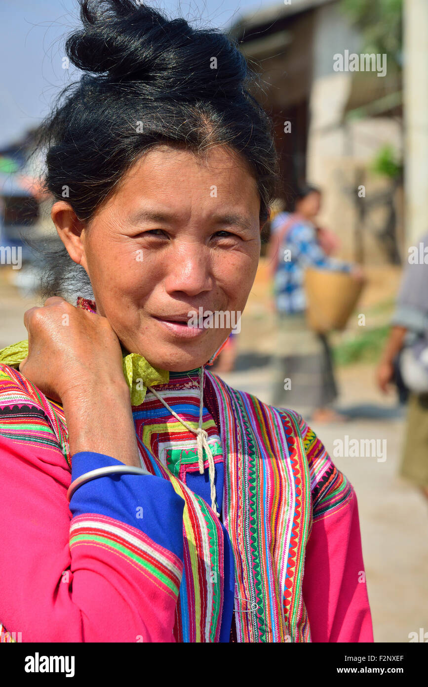 Tribal woman carrying goods at Phekhone (Phe-khone) Jetty, Phekhone Village,  Myanmar (Burma, Birma), Asia Stock Photo