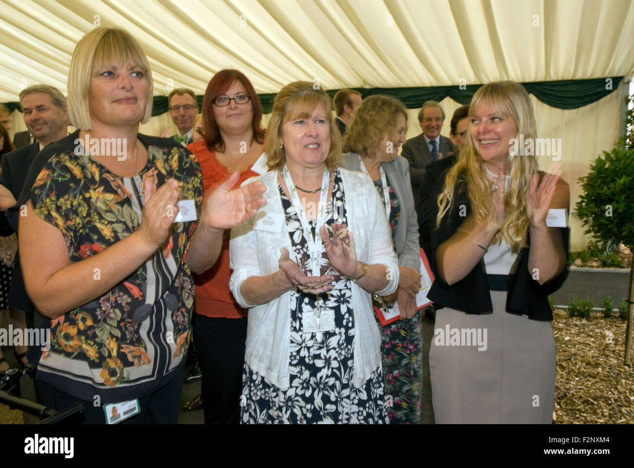 Members of school staff applauding a visit by Her Royal Highness the Countess of Wessex during her visit to Treloar School... Stock Photo