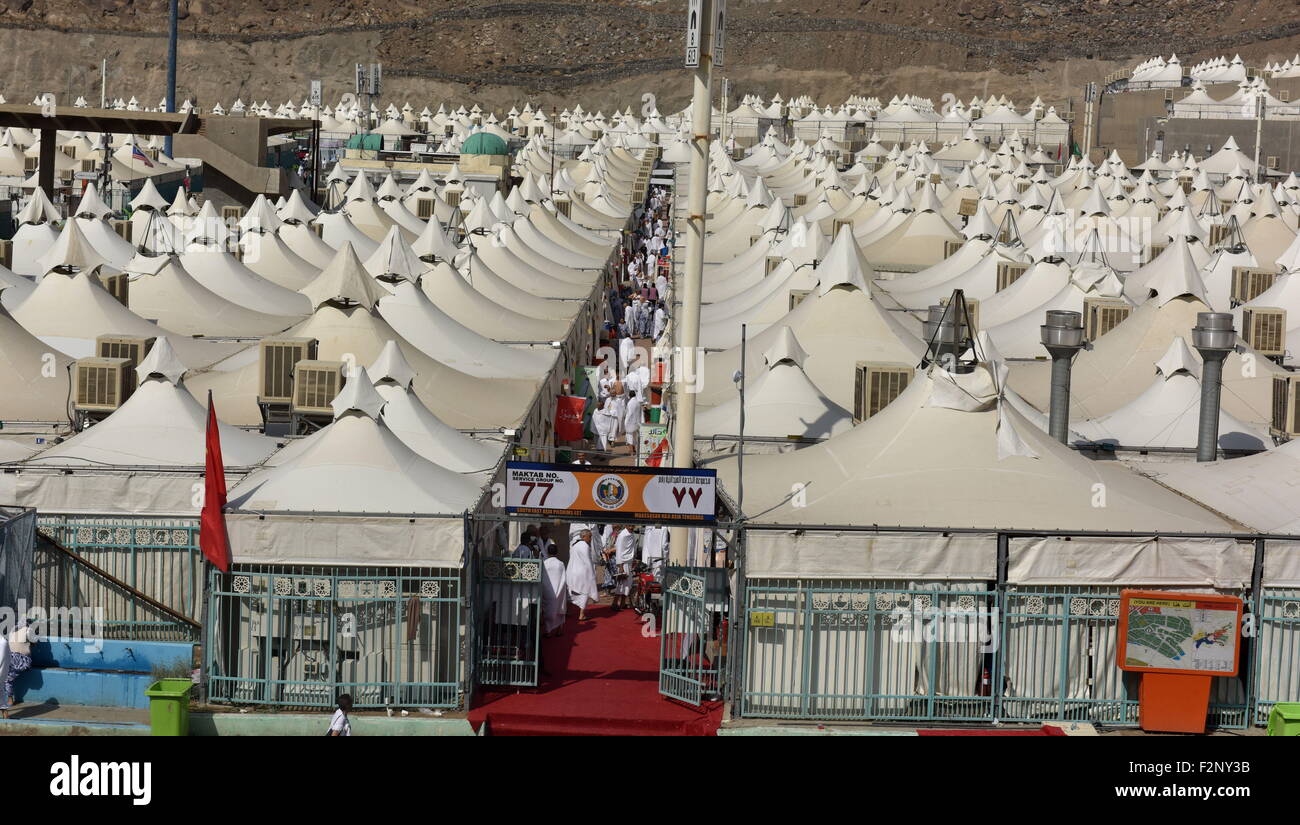 Mecca, Saudi Arabia. 22nd Sep, 2015. Pilgrims prepare to pray and stay overnight in tents in Mina, about seven km from Mecca, in Saudi Arabia, Sept. 22, 2015. According to the rigid Hajj schedule, pilgrims will pray and stay overnight in tents of Mina, before moving on to Arafat, a barren and plain land some 20 km east of Mecca, and then to Muzdalifah, an area between Arafat and Mina, to celebrate Eid al-Adha, or the Feast of Sacrifice. Credit:  Min Junqing/Xinhua/Alamy Live News Stock Photo