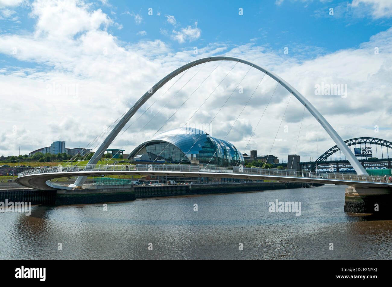 The Gateshead Millennium Bridge and the Sage Centre over the river Tyne, Newcastle-Gateshead, Tyne and Wear, England, UK. Stock Photo