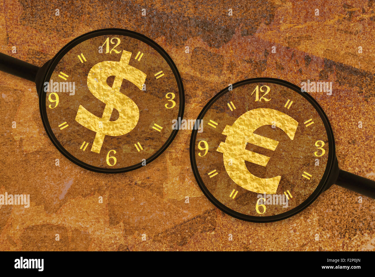 Currency symbols under magnifiers on a rusty background Stock Photo - Alamy