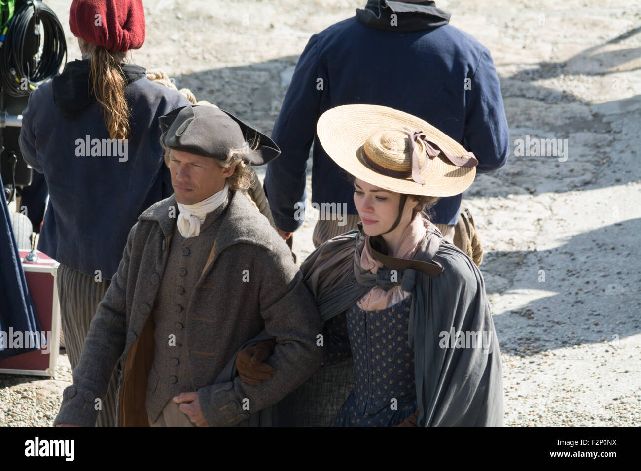 Charlestown, Cornwall, UK. 22nd September 2015. The BBC Poldark series, staring Aidan Turner, continues filming in Charlestown, with a crowd of onlookers watching. Credit:  Simon Maycock/Alamy Live News Stock Photo