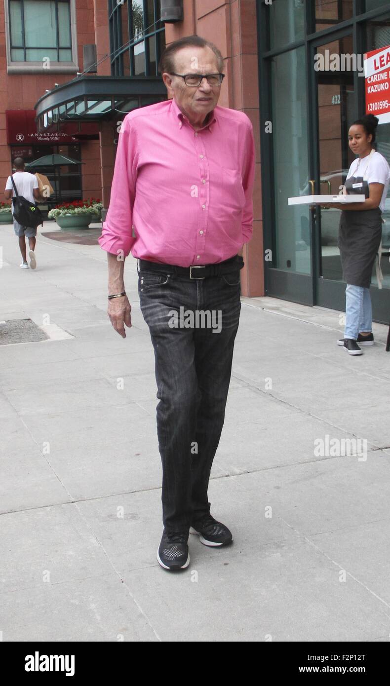Larry King goes shopping in Beverly Hills in a pink shirt, jeans and Stock  Photo - Alamy