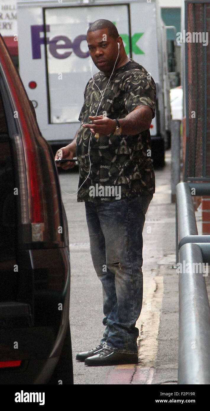 Busta Rhymes leaves an office in Beverly Hills giving a hand gesture