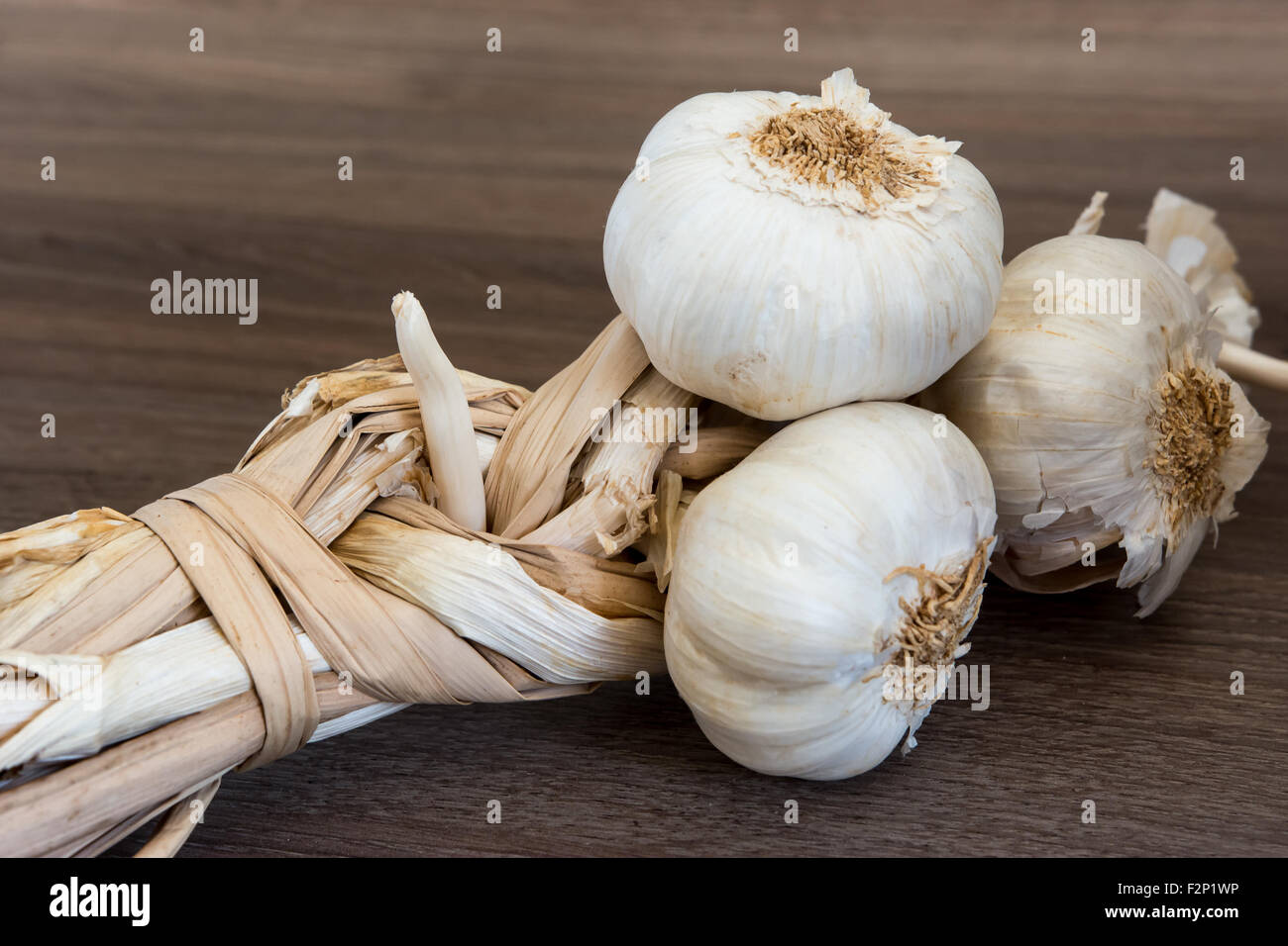 Organic garlic braid Stock Photo