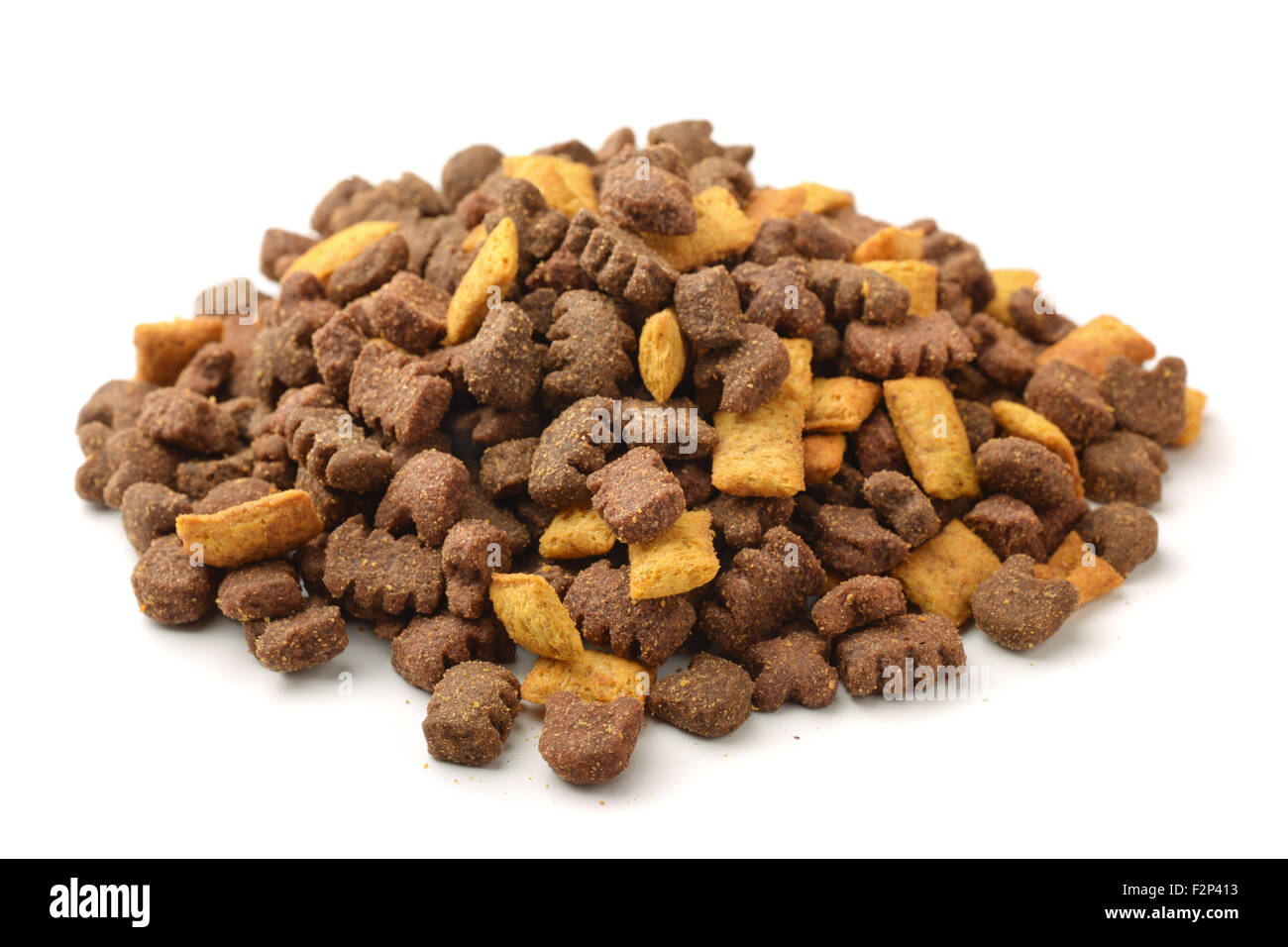 Heap of dry pets food isolated on white Stock Photo
