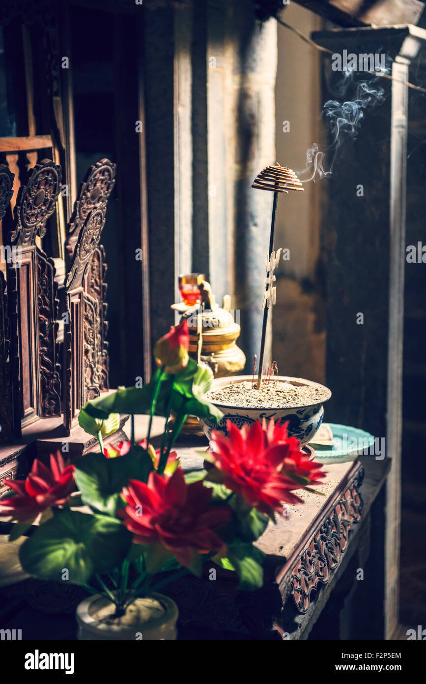 Vietnam, Hanoi, incense burning in buddhist altar Stock Photo Alamy