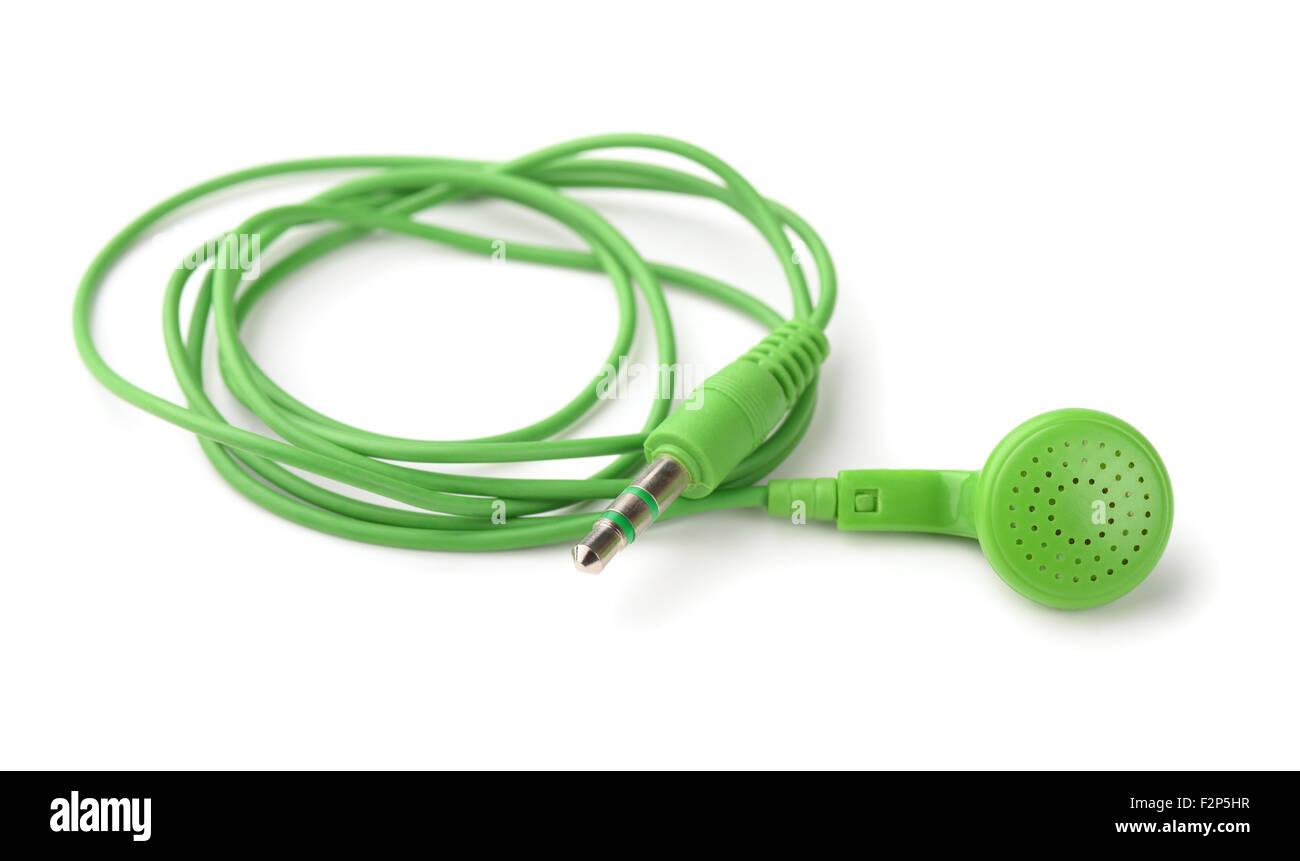 Single green  in ear earphone isolated on white Stock Photo