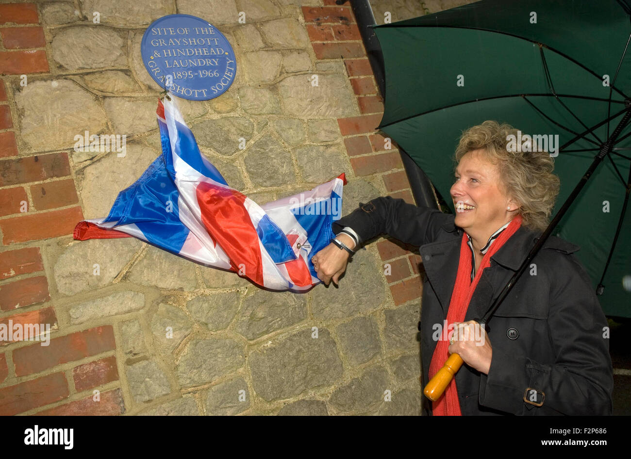 Chairperson of the Grayshott Society unveiling the Blue Plaque at the site of former Grayshott & Hindhead Laundry (1895-1966)... Stock Photo