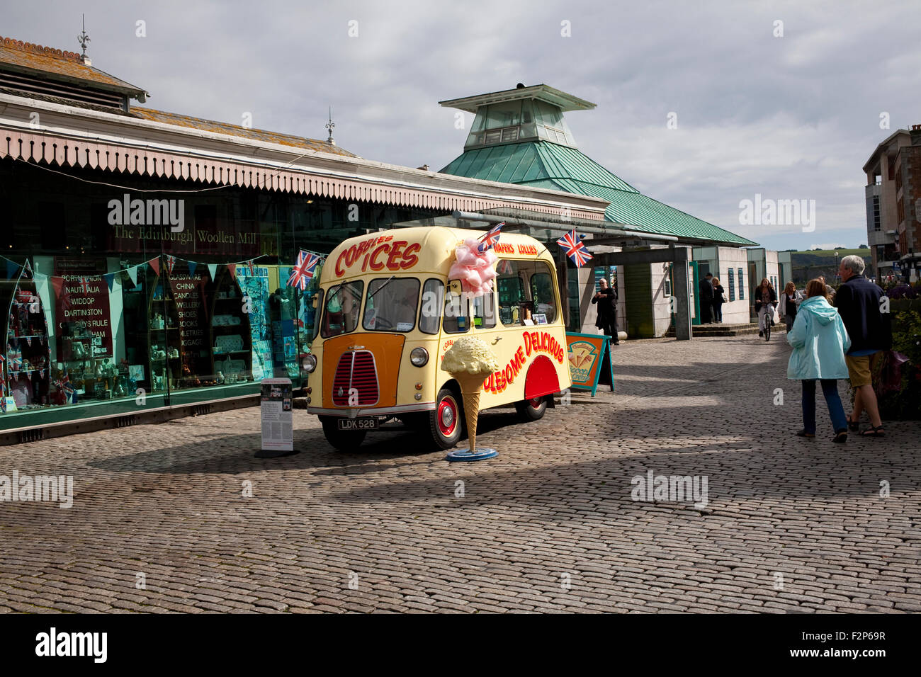 Morris j type icecream van on the cobbled quayside of Sutton harbour