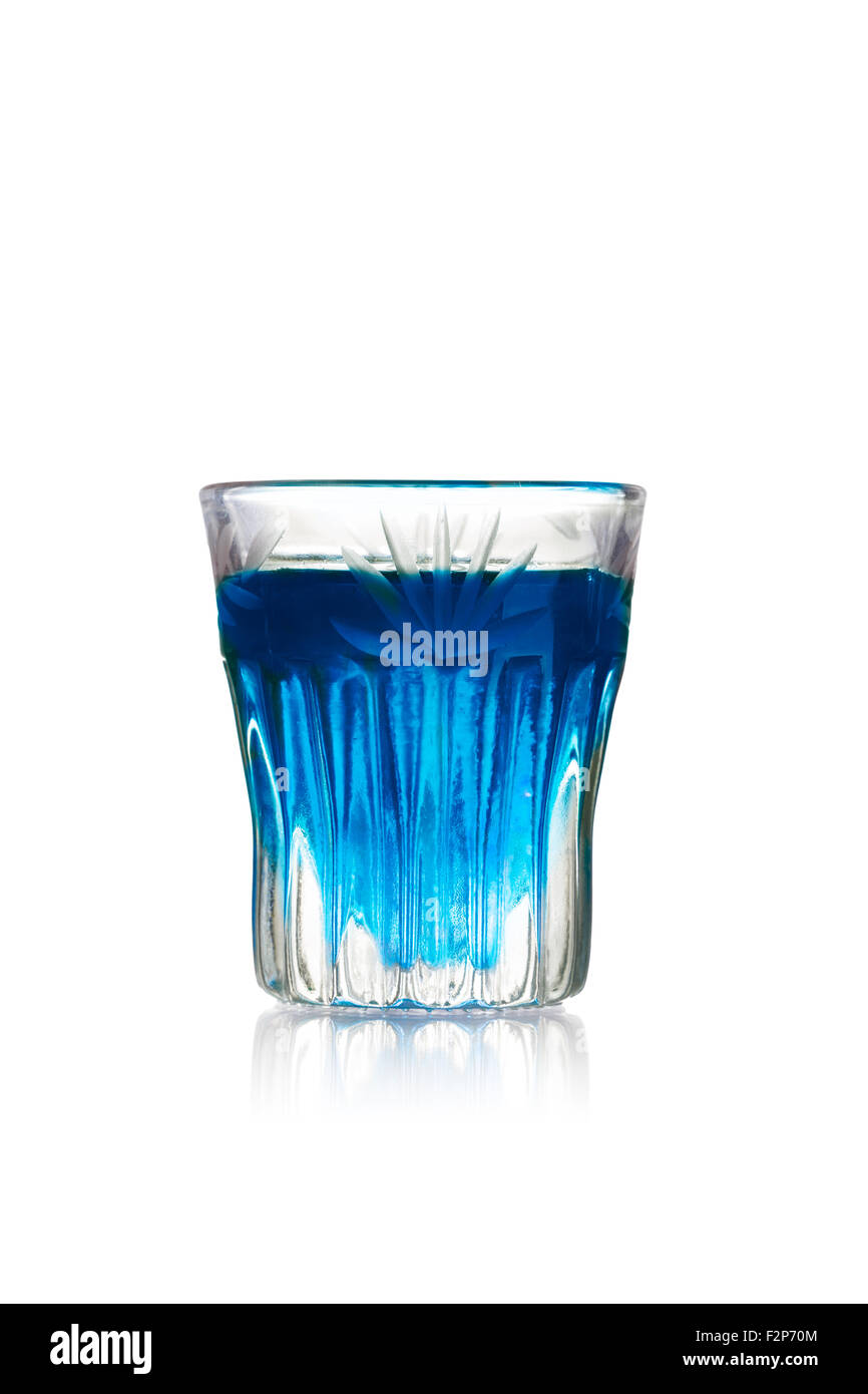 Blue kamikaze alcoholic cocktail in shot glass (shooter) Stock Photo