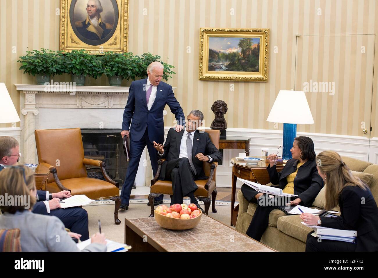 U.S. President Barack Obama is congratulated by Vice President Joe Biden in the Oval Office of the White House after the Supreme Court ruled in favor of the Affordable Care Act June 25, 2015 in Washington, DC. Stock Photo