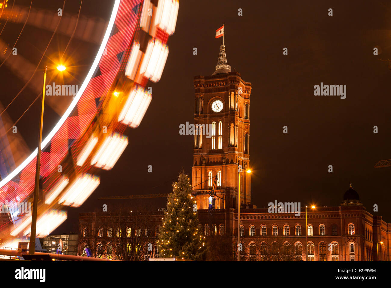 berlin red town hall and ferris wheel for christmas Stock Photo