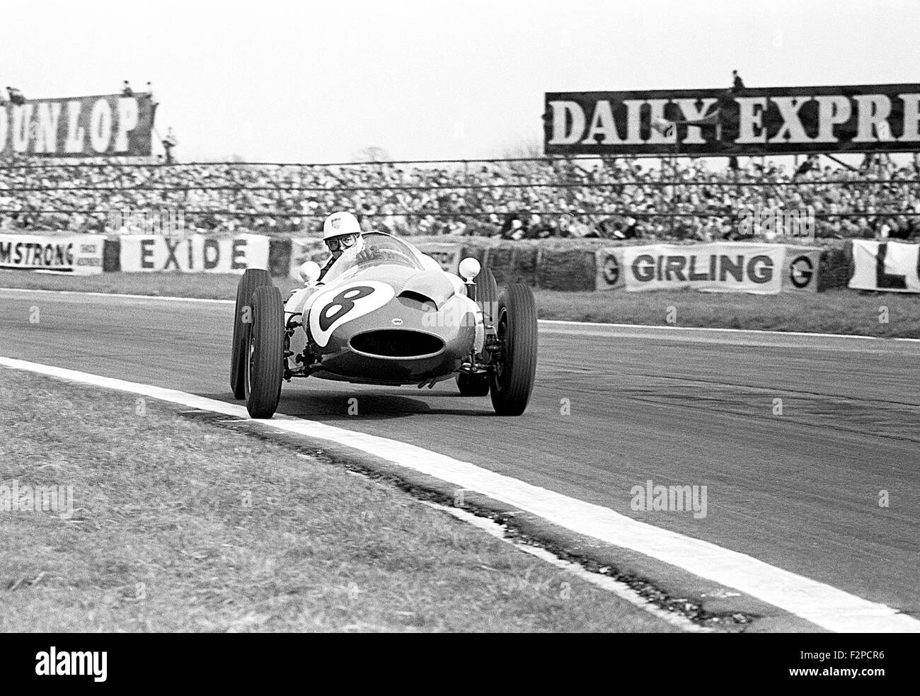 Harry Schell in a Yeoman Credit Cooper T51 racing at Easter at Goodwood 1960 Stock Photo