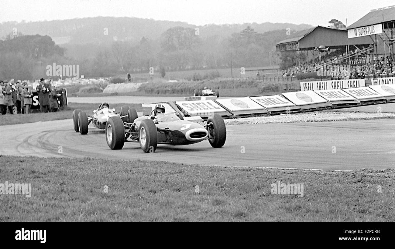 Graham Hill in a BRM racing Jim Clark in a Lotus at Goodwood 1964 Stock Photo