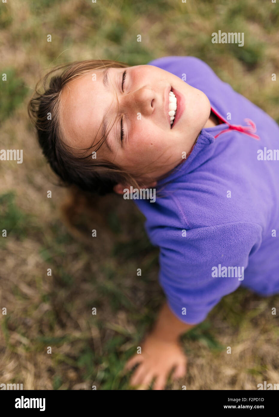 Portrait of girl with closed eyes relaxing on a meadow Stock Photo - Alamy