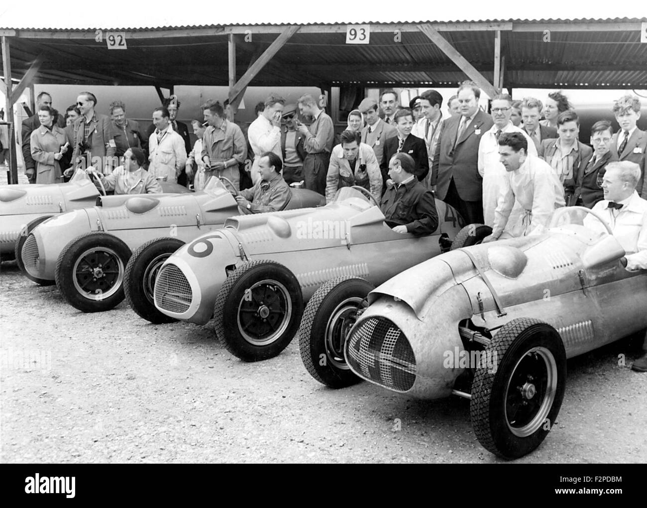 Cooper line up with Alan Brown, Eric Brandon,Fangio and Mike Hawthorn, Goodwood 1952 Stock Photo