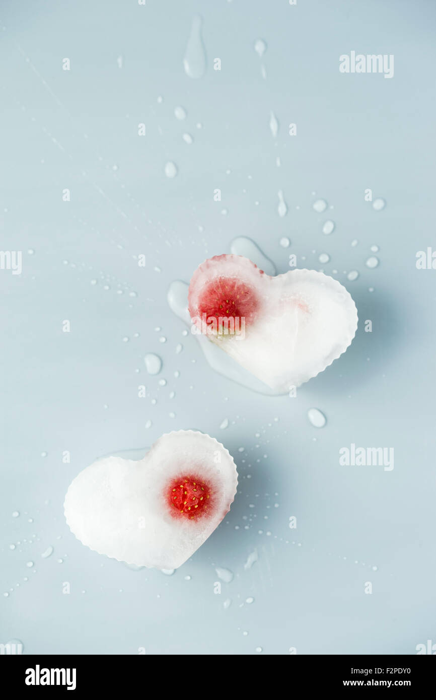 Heart shaped ice cubes with strawberry Stock Photo Alamy
