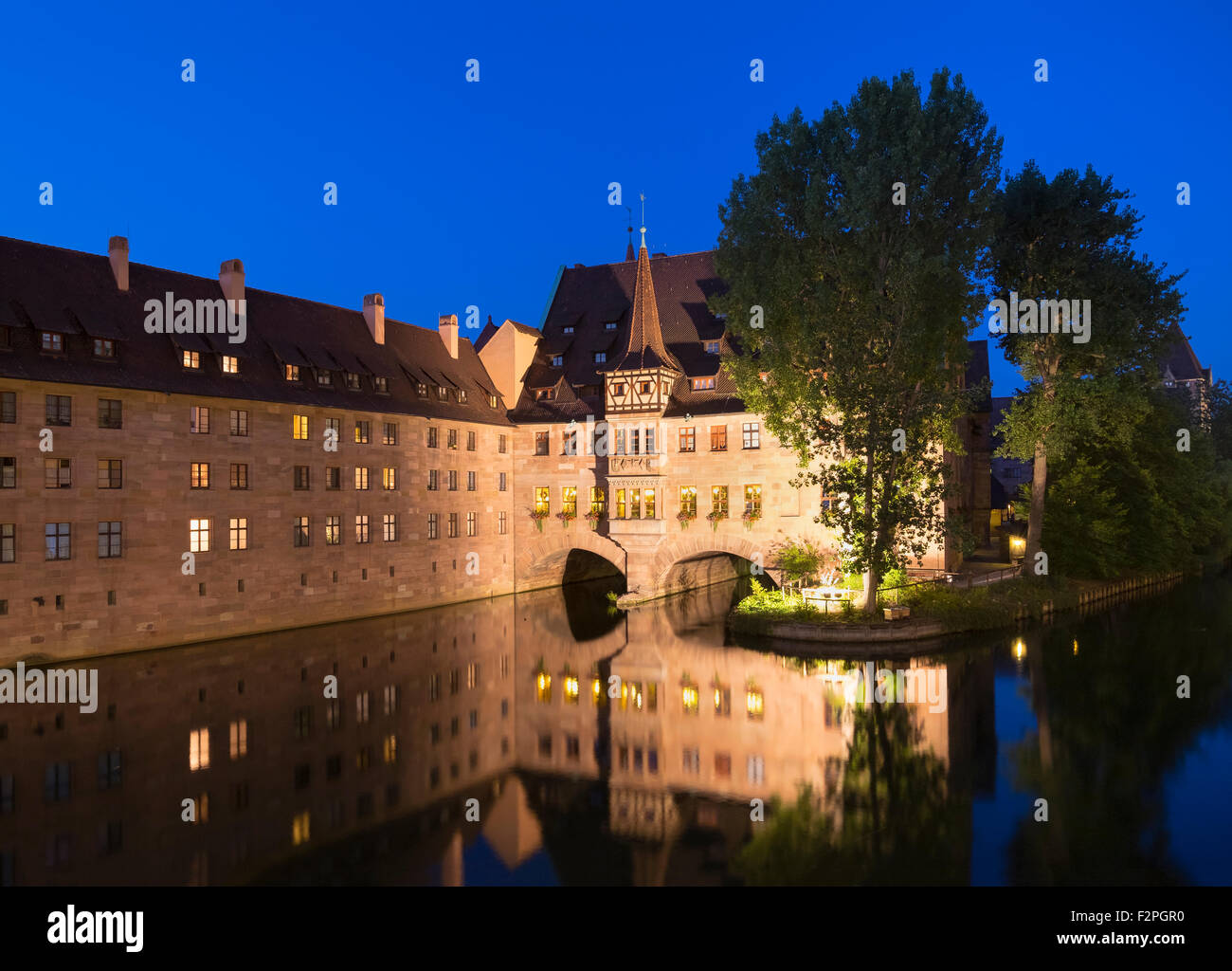 Germany, Nuremberg, Heilig-Geist-Spital on Pegnitz River Stock Photo