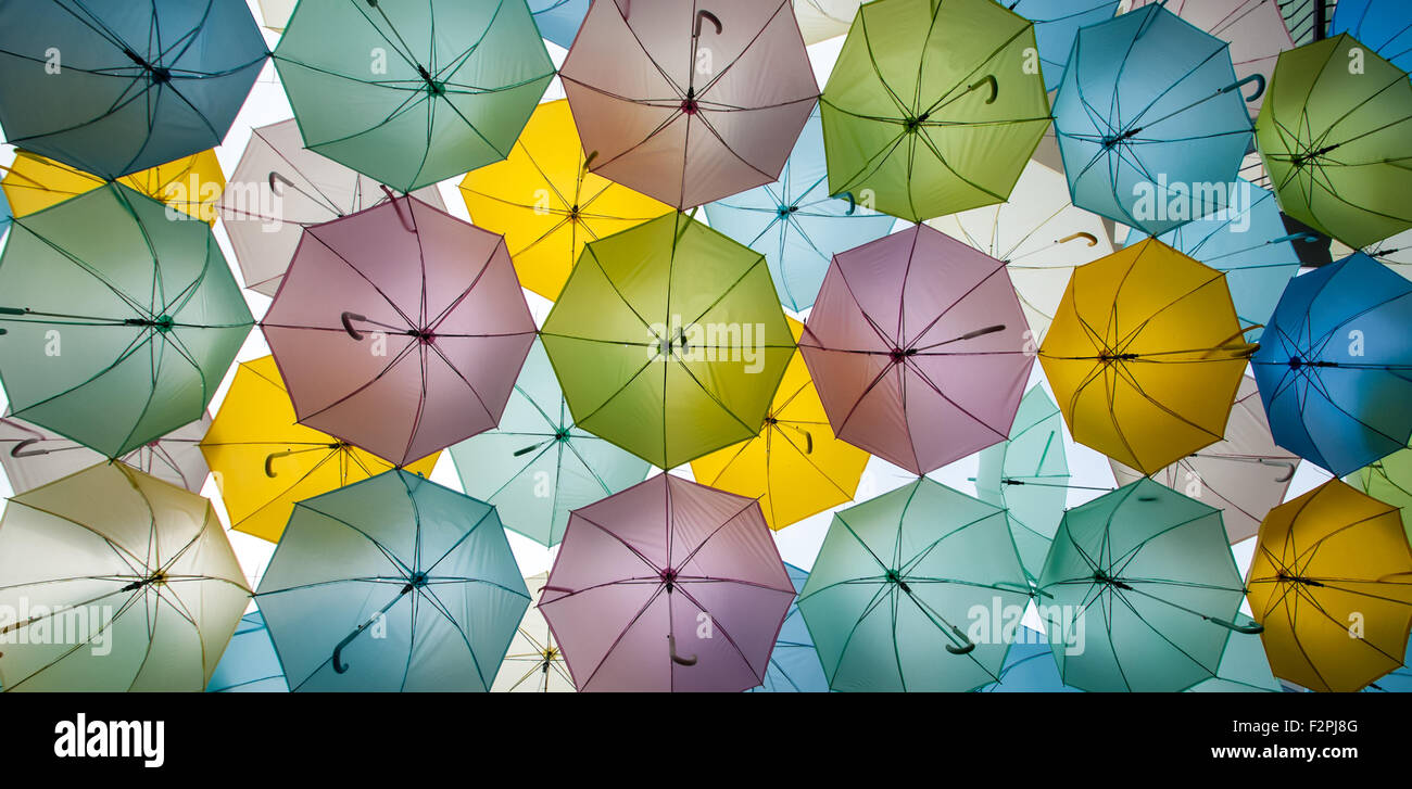 A ceiling of umbrellas in a backstreet market in Bangkok, Thailand