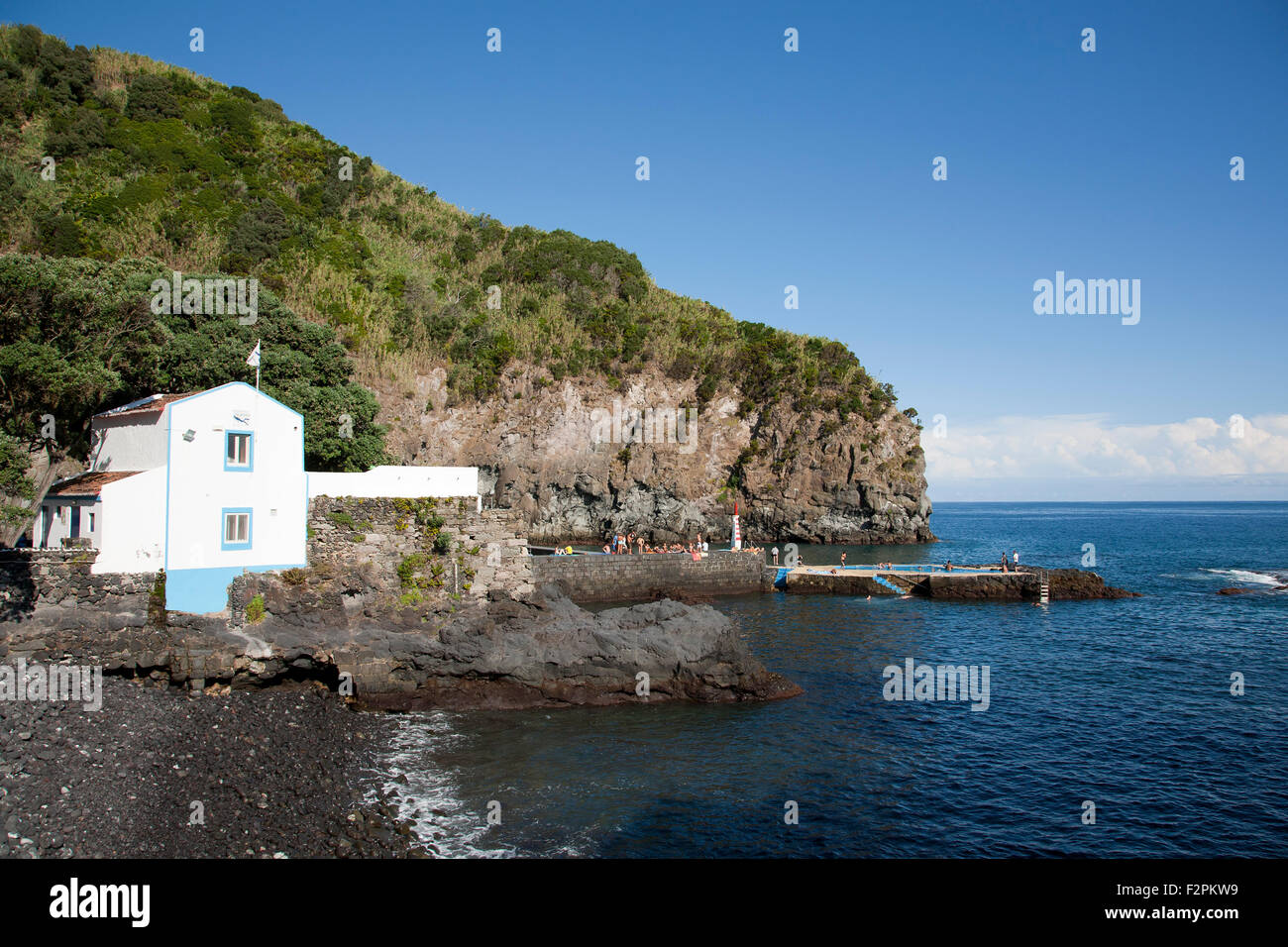 The harbour of Caloura in a hot Summer day. Sao Miguel island, Azores islands, Portugal. Stock Photo