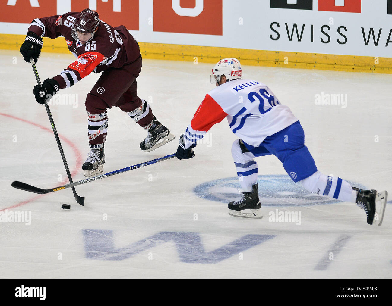 Prague, Czech Republic. 22nd Sep, 2015. From right: Ryan Keller of Zurich and Michal Cajkovsky of Sparta during the ice hockey Champions League, 1st round play off match HC Sparta Praha vs ZSC Zurich Lions in Prague, Czech Republic, September 22, 2015. © Katerina Sulova/CTK Photo/Alamy Live News Stock Photo