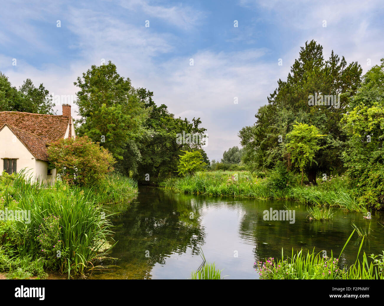 View featured in Constable’s painting The Hay Wain, with Willy Lott’s Cottage on  left, Flatford Mill, East Bergholt, Essex, UK Stock Photo