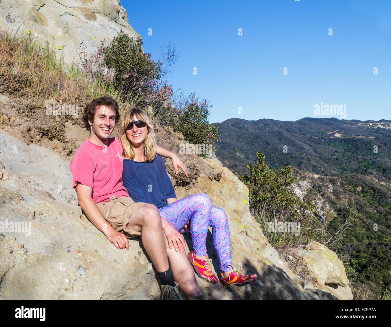 Couple relaxing along the Santa Ynez Trail in Topanga State Park Stock Photo