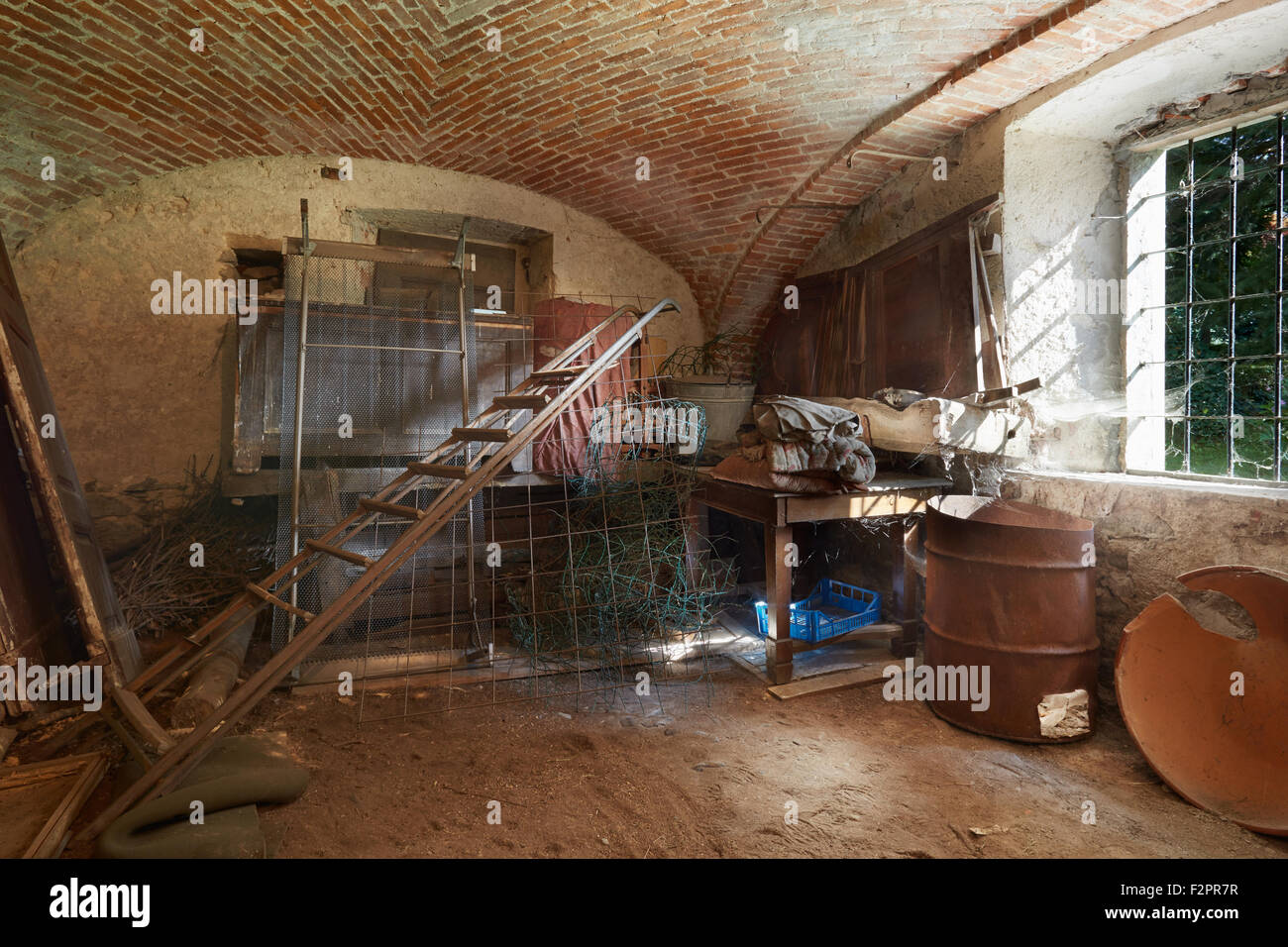 Old, messy basement in ancient house Stock Photo