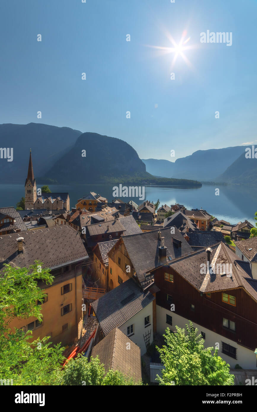 Sunny summer day in the Hallstatt village in the Austrian Alps. Maria am Berg church and Hallstattersee lake, Austria, Europe. Stock Photo