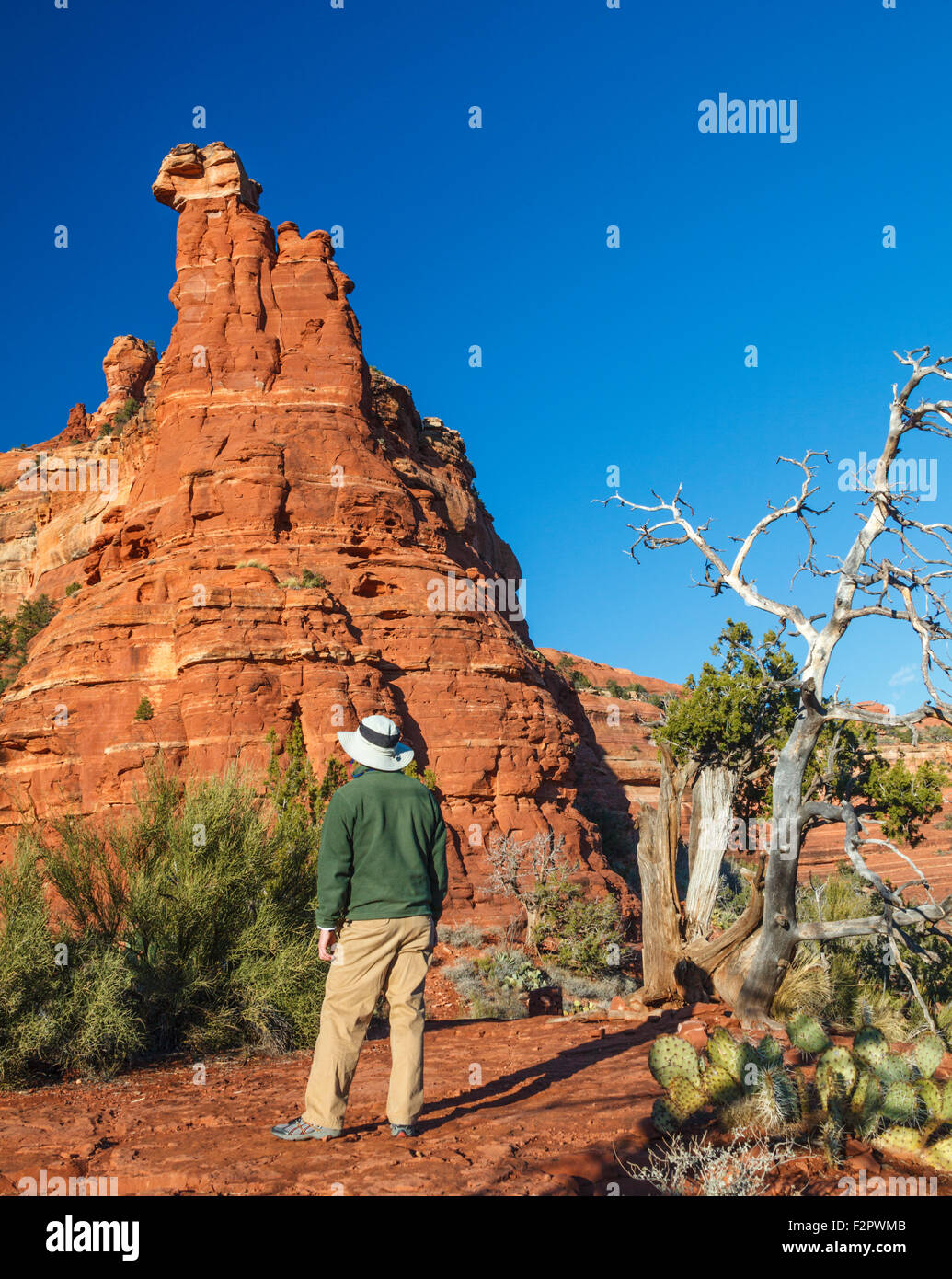 Hiker by Kachina Woman in Sedona Stock Photo Alamy