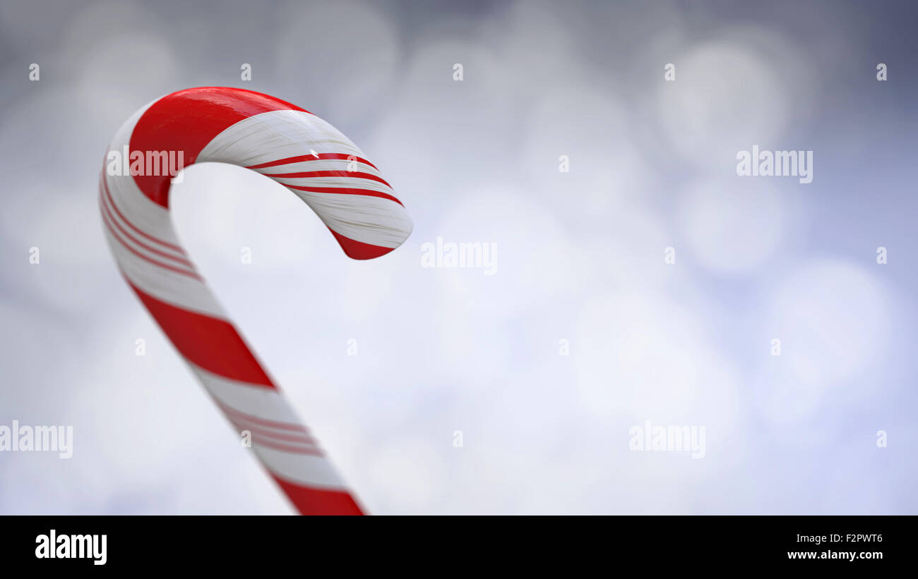 Candy Cane with selective focus on White, blue Background, Christmas ...