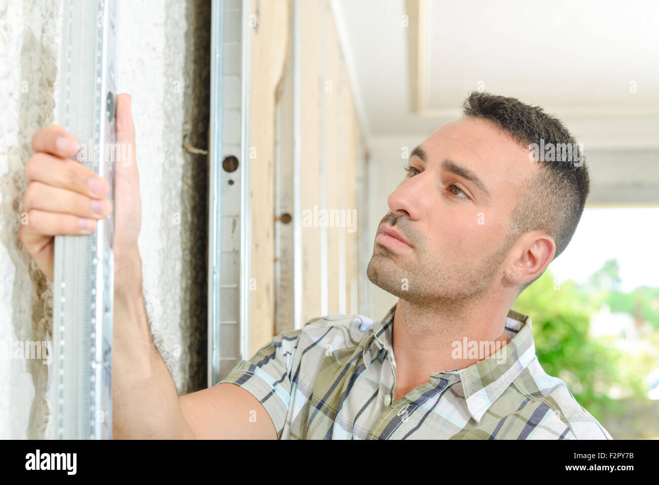 Installing wall partition hi-res stock photography and images - Alamy