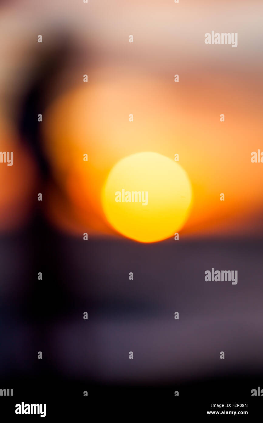 Abstract bokeh of the sun and a person Stock Photo