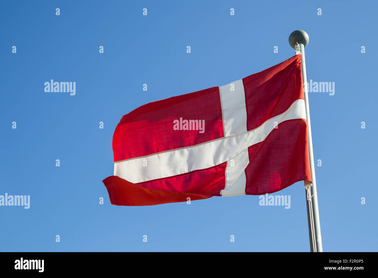 Photograph of the Danish Flag called Dannebrog. Stock Photo