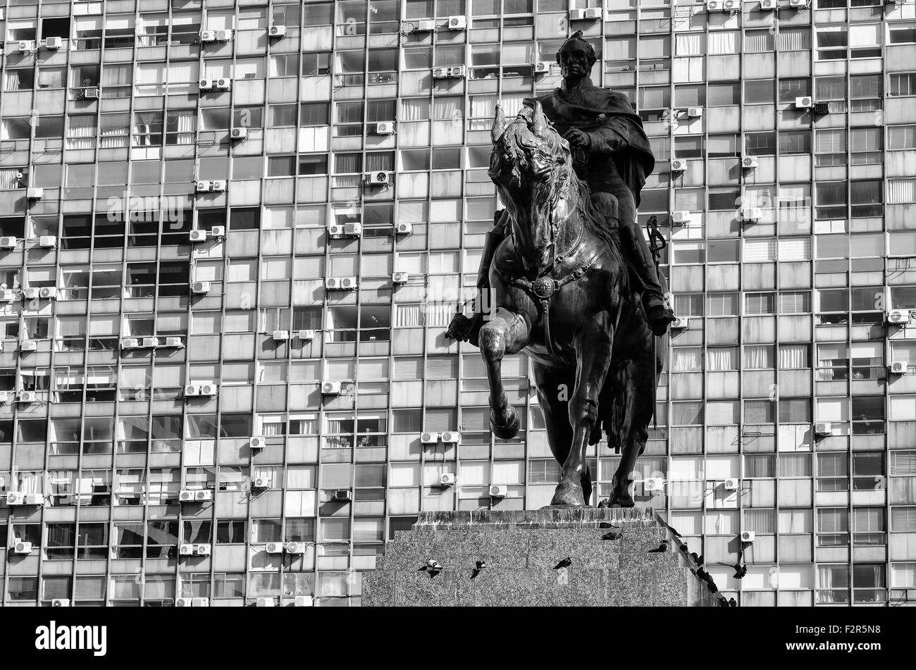 Montevideo downtown scene with the statue of national hero Artigas against the background of high rise buildings Stock Photo