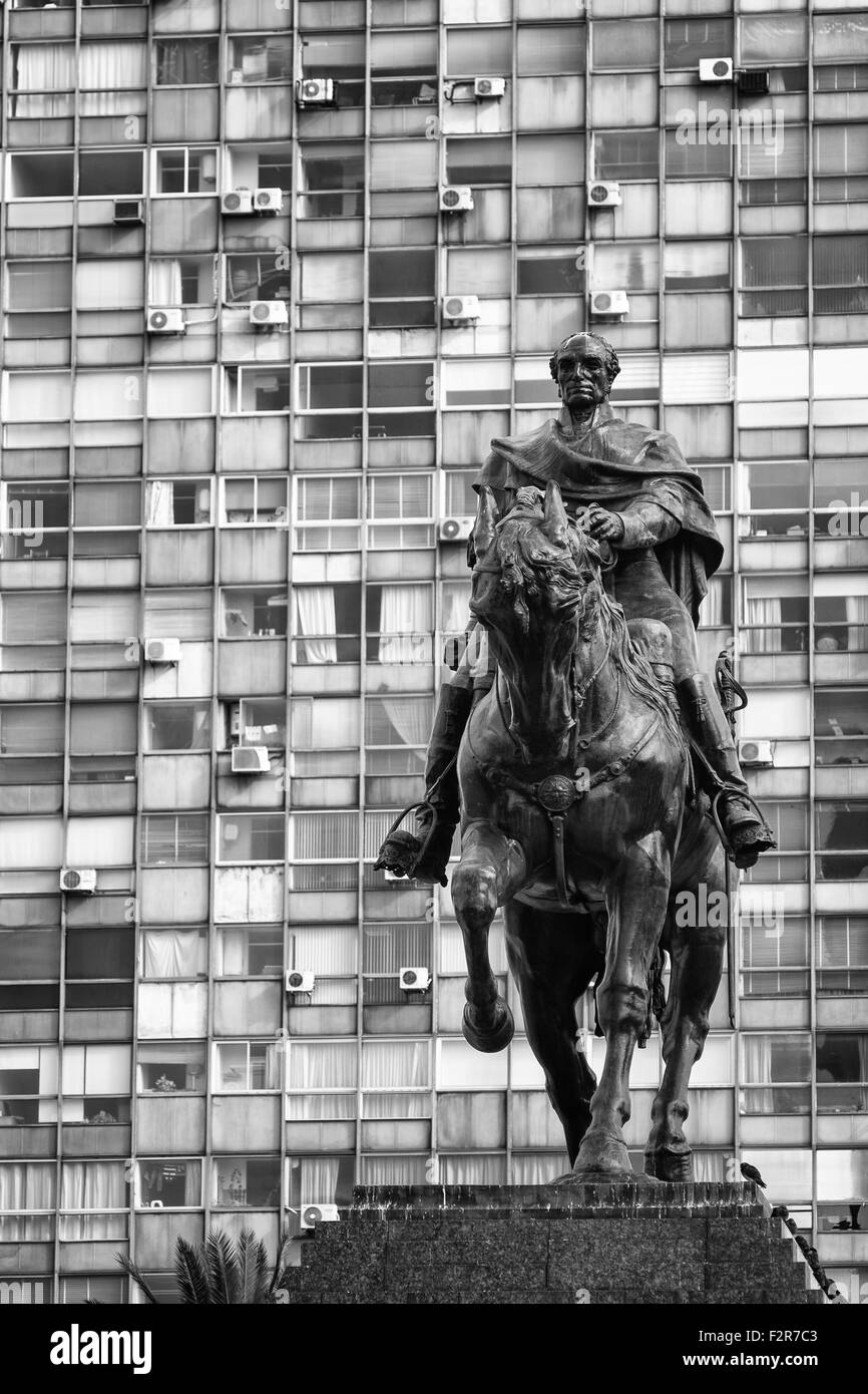 Montevideo downtown scene with the statue of national hero Artigas against the background of high rise buildings Stock Photo