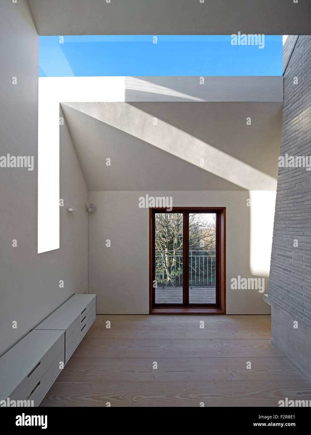 Living room on top floor. The Coach House, London, United Kingdom. Architect: John Smart Architects, 2014. Stock Photo