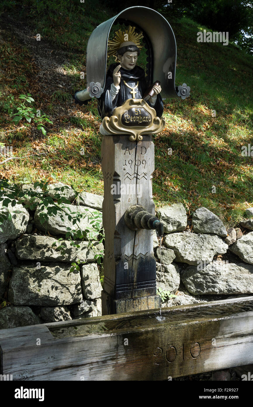 Wood sculpture of holy St. Leonhard, Calvary, Bad Tölz, Upper Bavaria, Bavaria, Germany Stock Photo