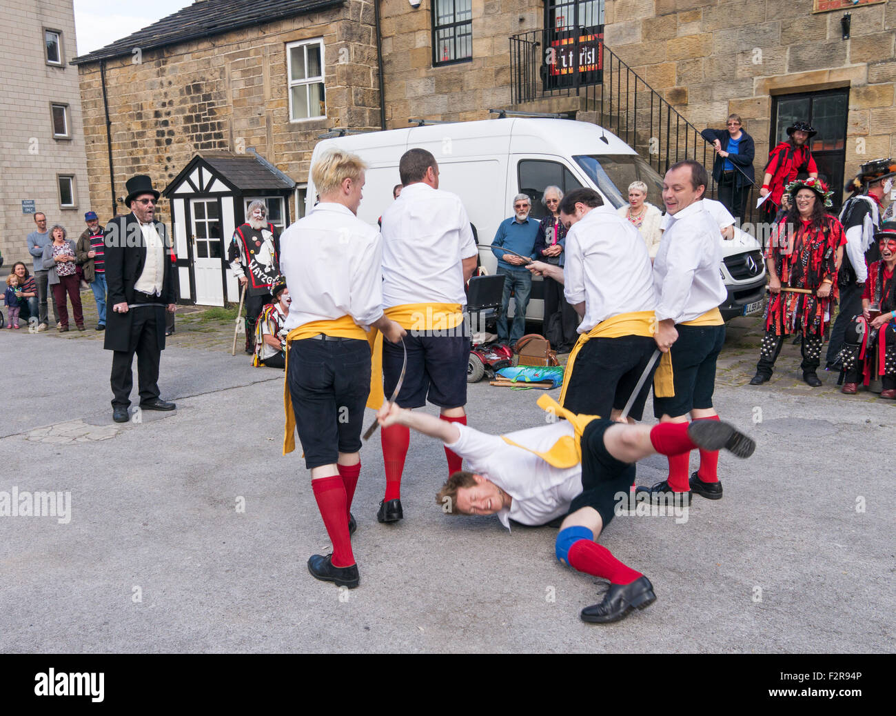 Black Swan Rapper dancer falls while tumbling at Otley Folk Festival 2015, West Yorkshire, England, UK Stock Photo