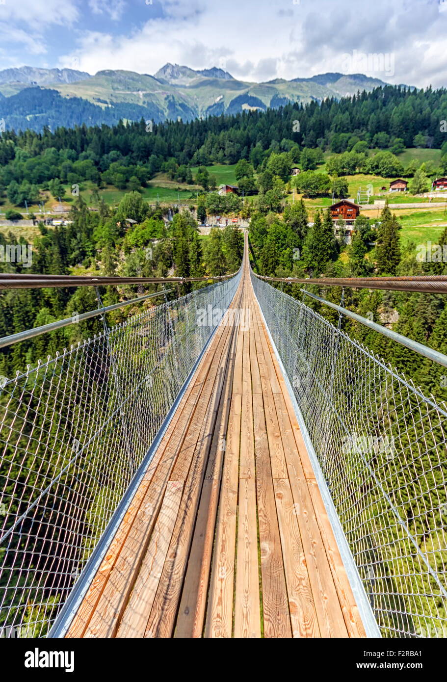 Lama suspended bridge and Alps mountains, Valais, Switzerland Stock Photo
